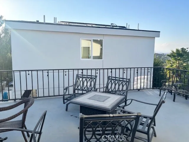 26173 Abdale Street Newhall, CA 91321 - Photo 3 of 15 a view of a balcony with furniture