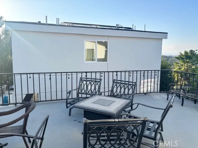 26173 Abdale Street Newhall, CA 91321 - Photo 3 of 15 a view of a balcony with furniture