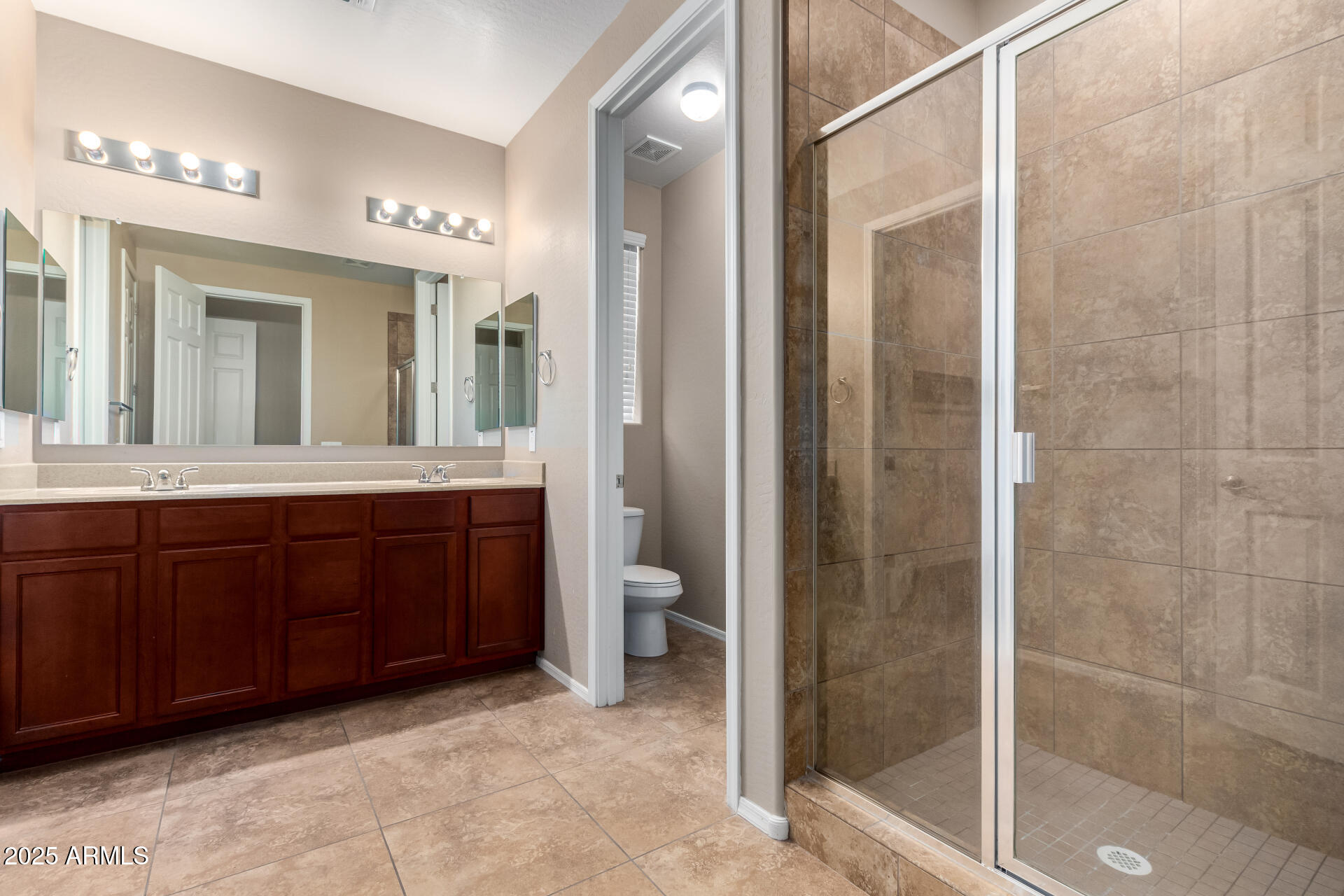 16093 West Almeria Road Goodyear, AZ 85395 - Photo 22 of 38 primary bath