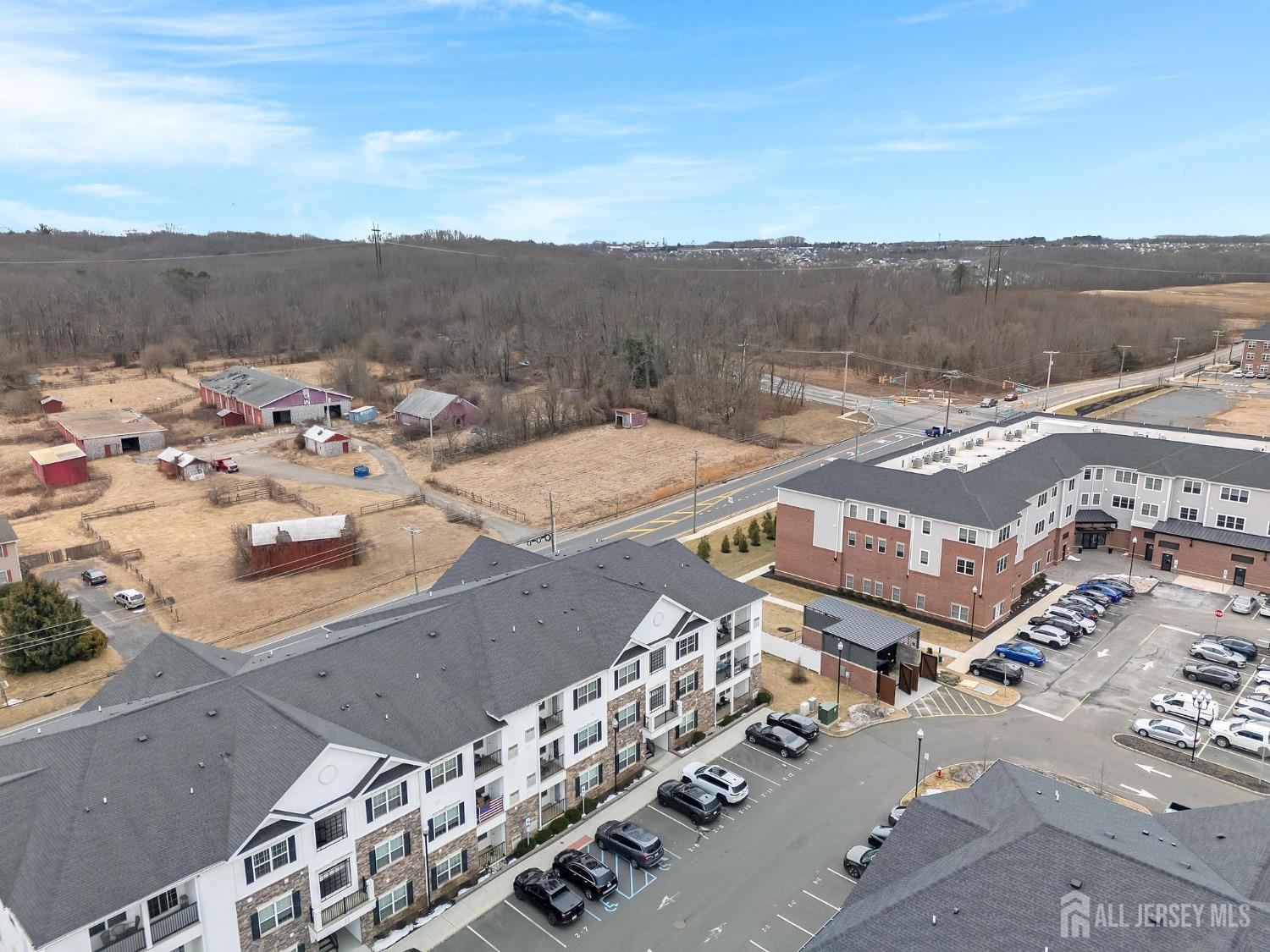 415 Tavern Road Monroe Township, NJ 08831 - Photo 36 of 39 an aerial view of residential houses with outdoor space