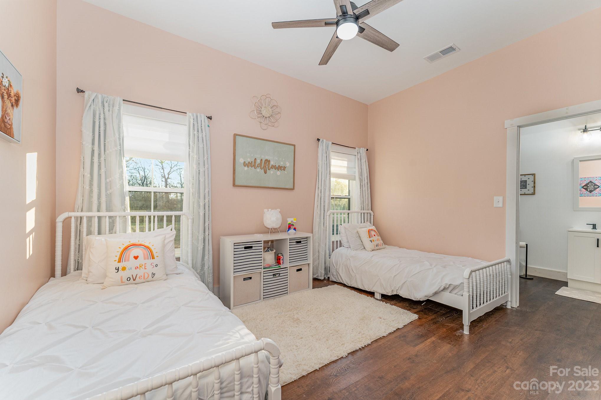 5261 Henderson Road Hamptonville, NC 27020 - Photo 17 of 46 a bedroom with a bed and a window
