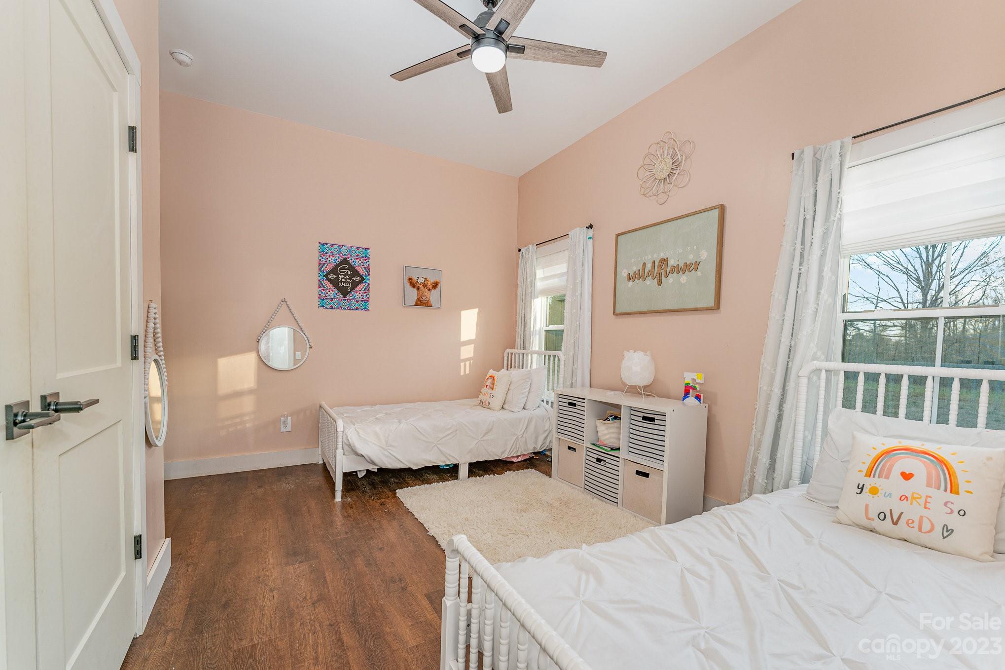 5261 Henderson Road Hamptonville, NC 27020 - Photo 18 of 46 a bedroom with a bed and a window