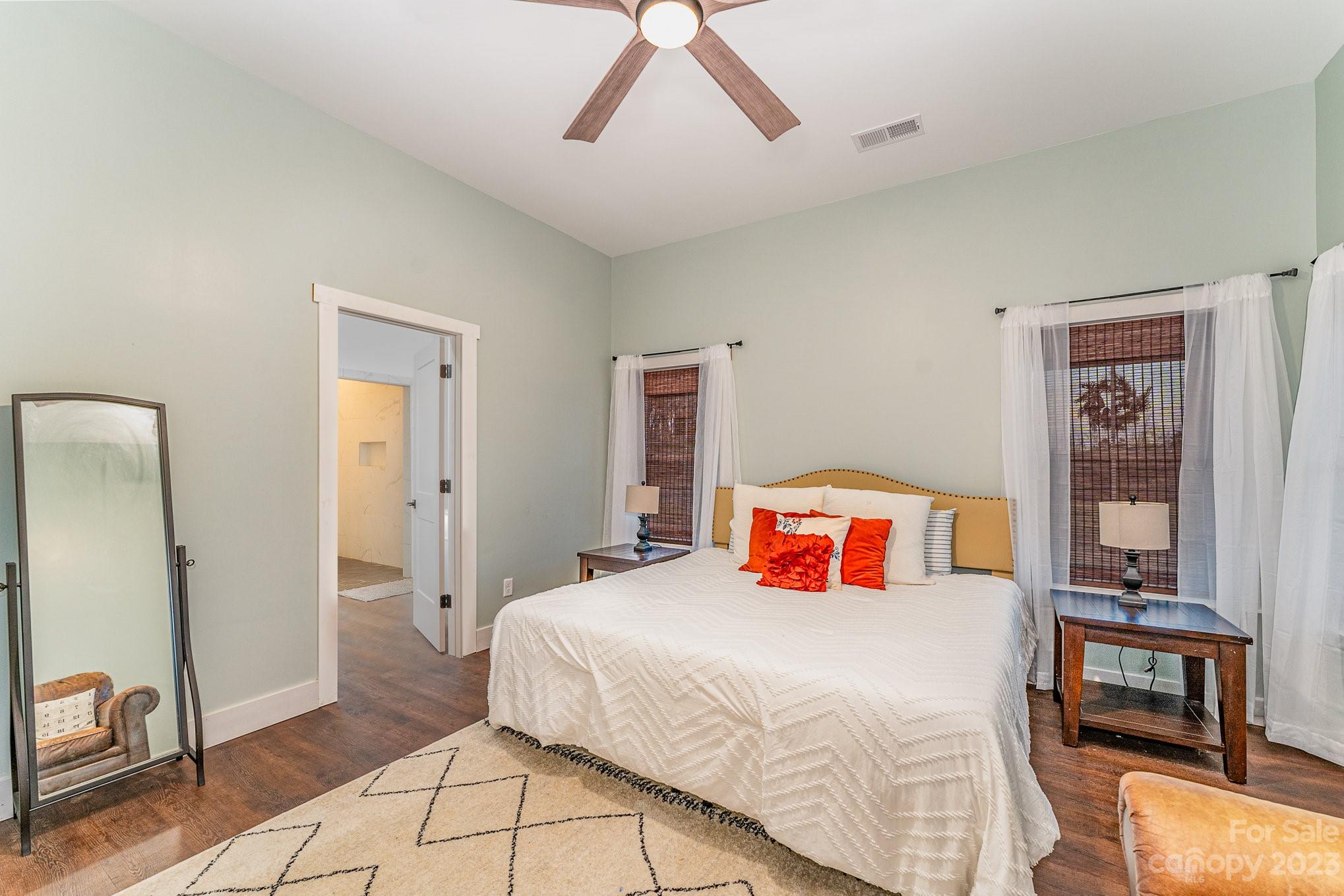 5261 Henderson Road Hamptonville, NC 27020 - Photo 23 of 46 a bedroom with a bed and a table
