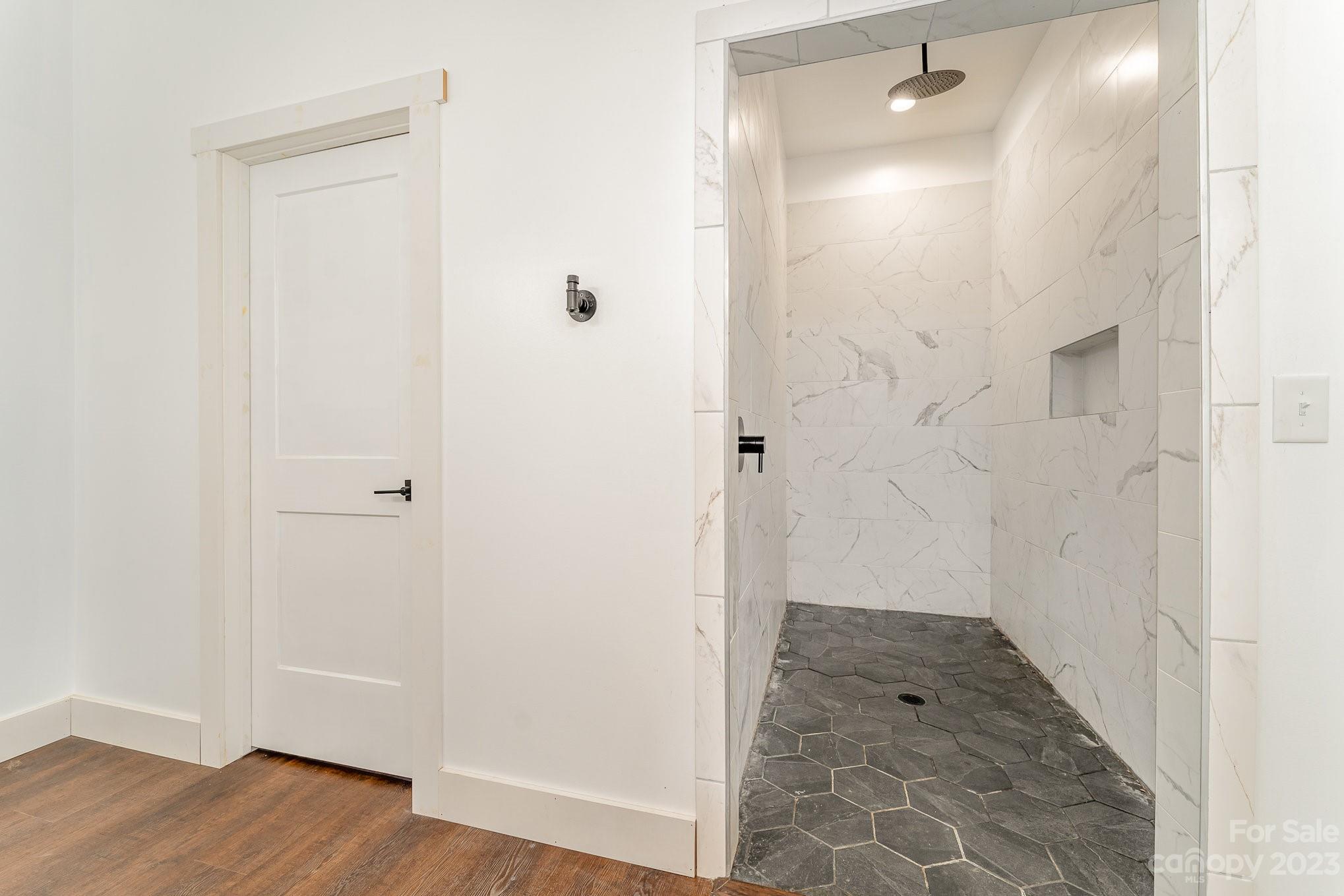 5261 Henderson Road Hamptonville, NC 27020 - Photo 24 of 46 an empty room with wooden floor