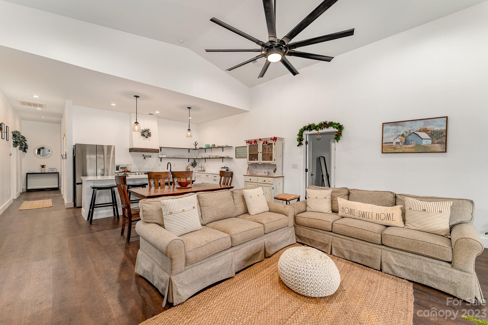 5261 Henderson Road Hamptonville, NC 27020 - Photo 27 of 46 a living room with furniture and a view of kitchen
