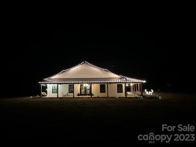 5261 Henderson Road Hamptonville, NC 27020 - Photo 40 of 46 a front view of a house with yard