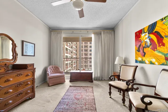 a bedroom with furniture and a window