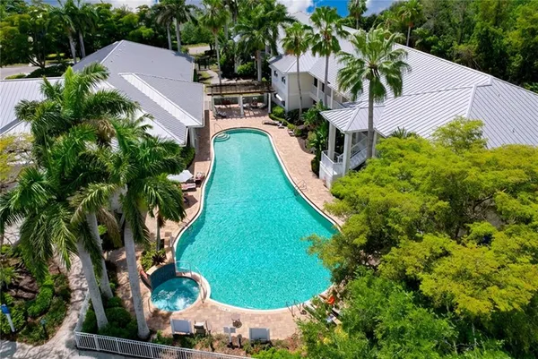 an aerial view of a house with a garden