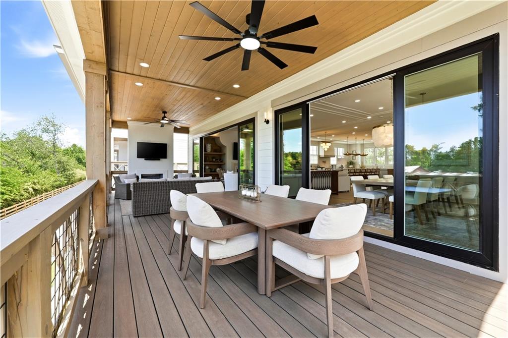 237 Lask Lane Milton, GA 30004 - Photo 57 of 63 a outdoor space with a large window and wooden floor