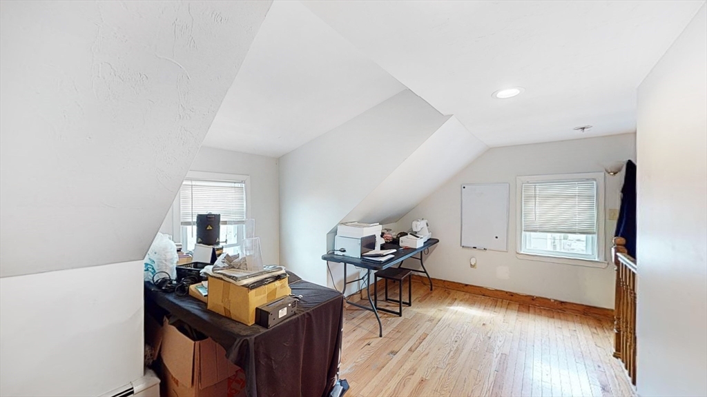 479 High Street Dedham, MA 02026 - Photo 15 of 22 a living room with furniture and wooden floor