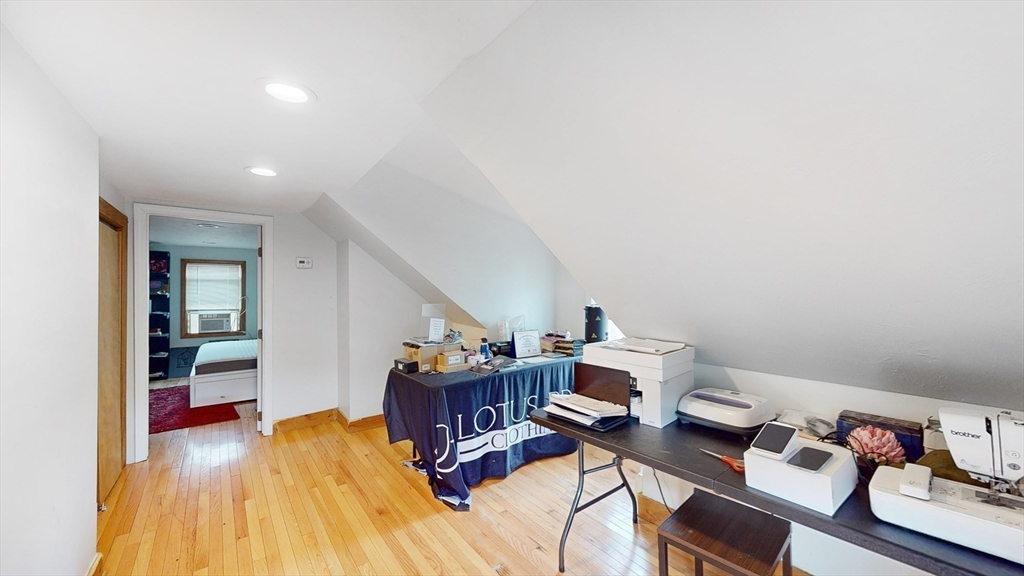 479 High Street Dedham, MA 02026 - Photo 16 of 22 a workspace with furniture and wooden floor