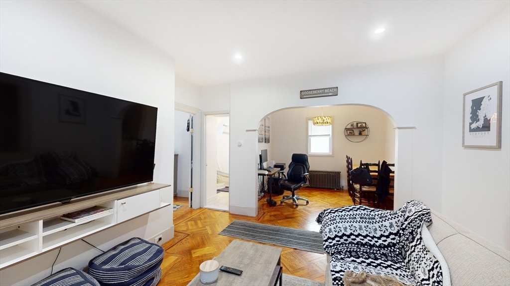 479 High Street Dedham, MA 02026 - Photo 4 of 22 a living room with furniture and a flat screen tv