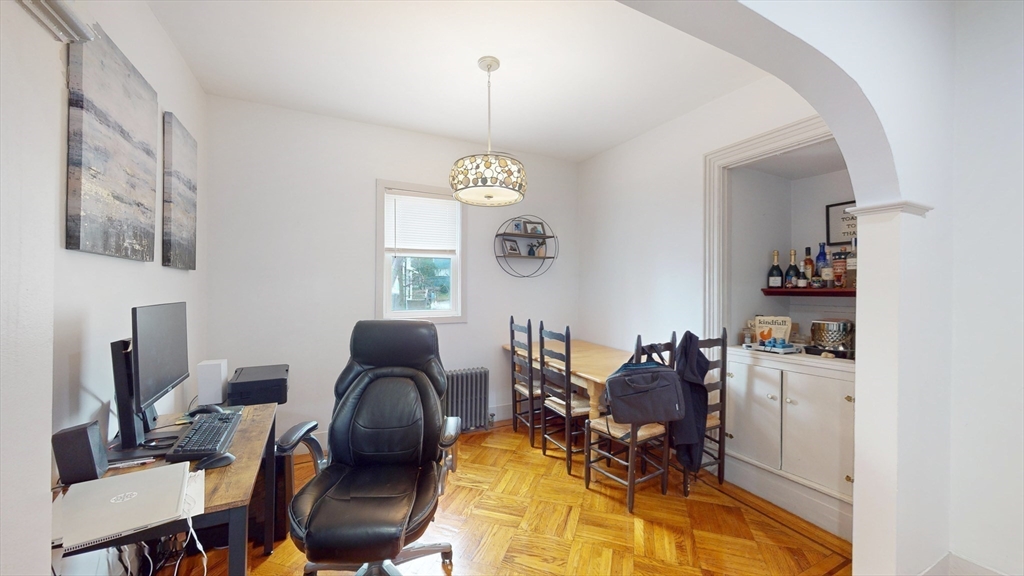 479 High Street Dedham, MA 02026 - Photo 7 of 22 a view of a workspace with furniture and a window
