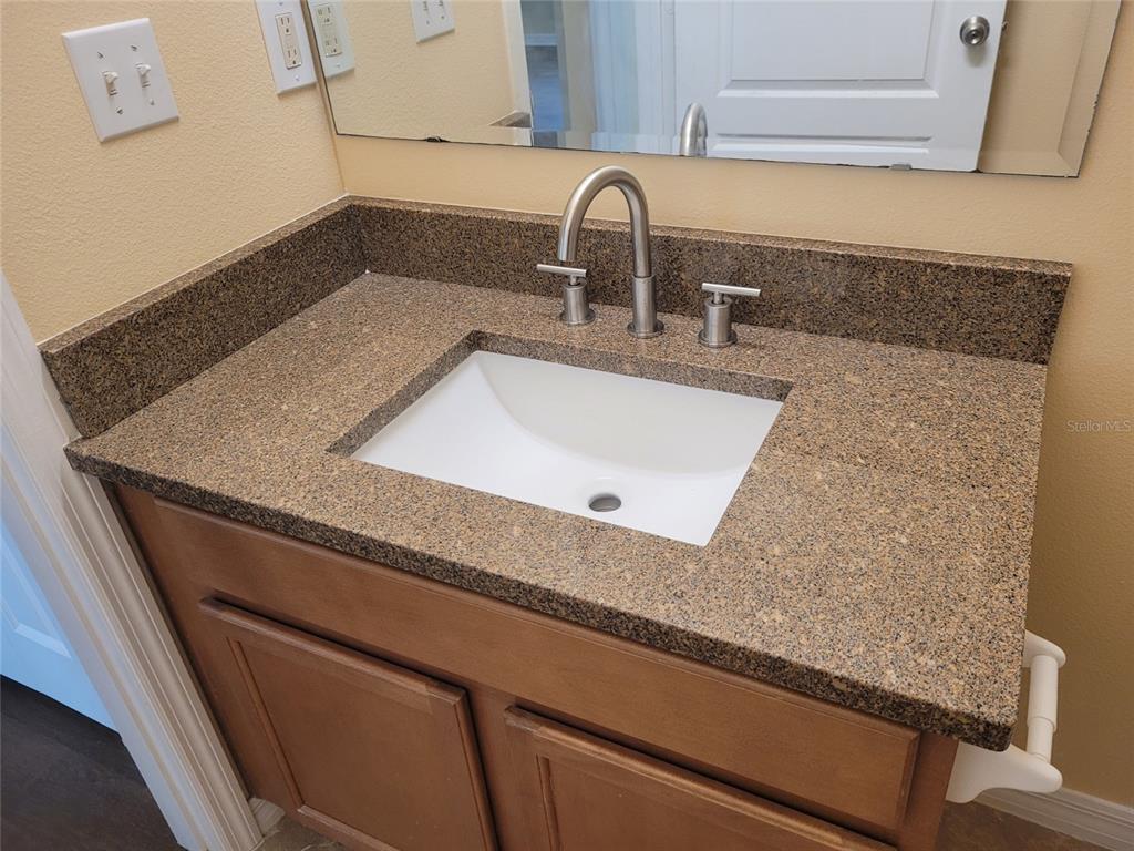 1555 Scarlet Oak Loop, Unit 113A Winter Garden, FL 34787 - Photo 10 of 11 a close view of sink and tap