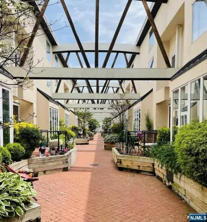 a view of a patio with table and chairs