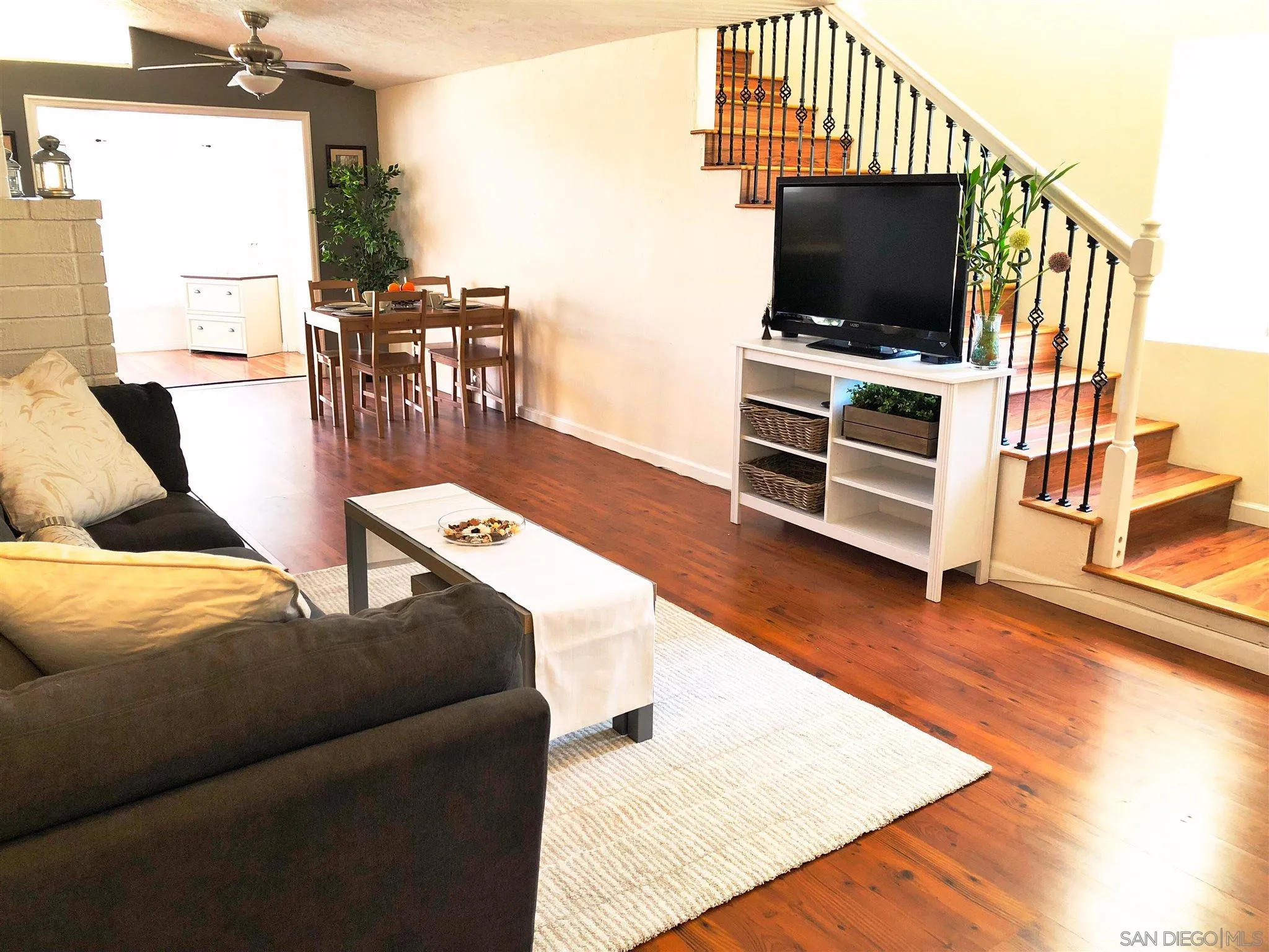 13727 Powers Road Poway, CA 92064 - Photo 4 of 4 a living room with furniture and a flat screen tv