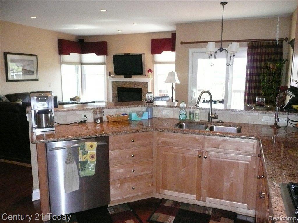 24955 Reeds Pointe Drive, Unit 7 Novi, MI 48374 - Photo 9 of 25 Kitchen Granite Counters