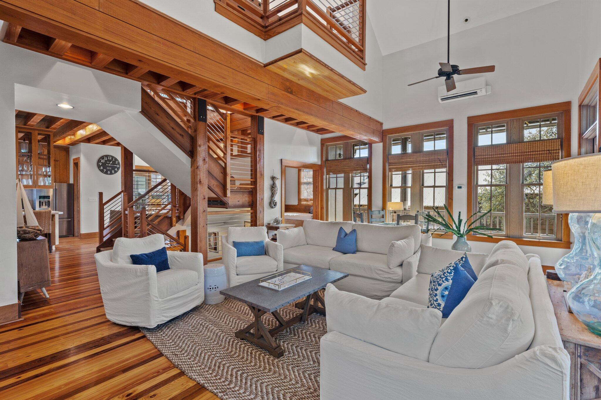 313 East Water Street Inlet Beach, FL 32461 - Photo 21 of 56 a living room with furniture and a large window