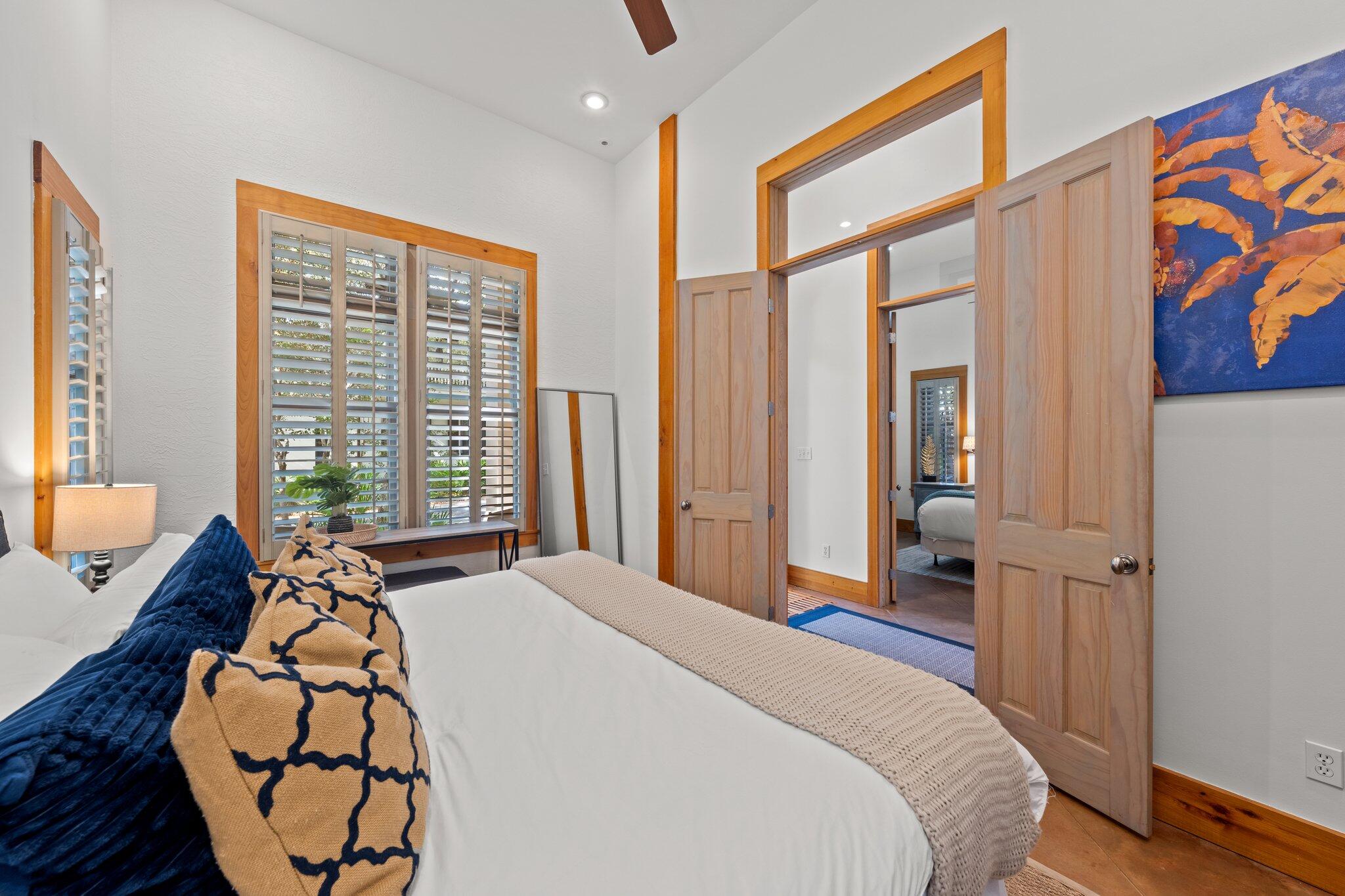 313 East Water Street Inlet Beach, FL 32461 - Photo 27 of 56 a bedroom with a bed and wooden floor