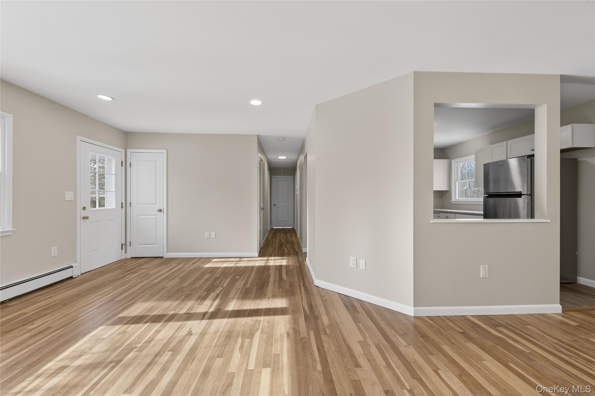 676-678 Oak Summit Road Millbrook, NY 12545 - Photo 10 of 22 a view of a room with wooden floor and a bathroom