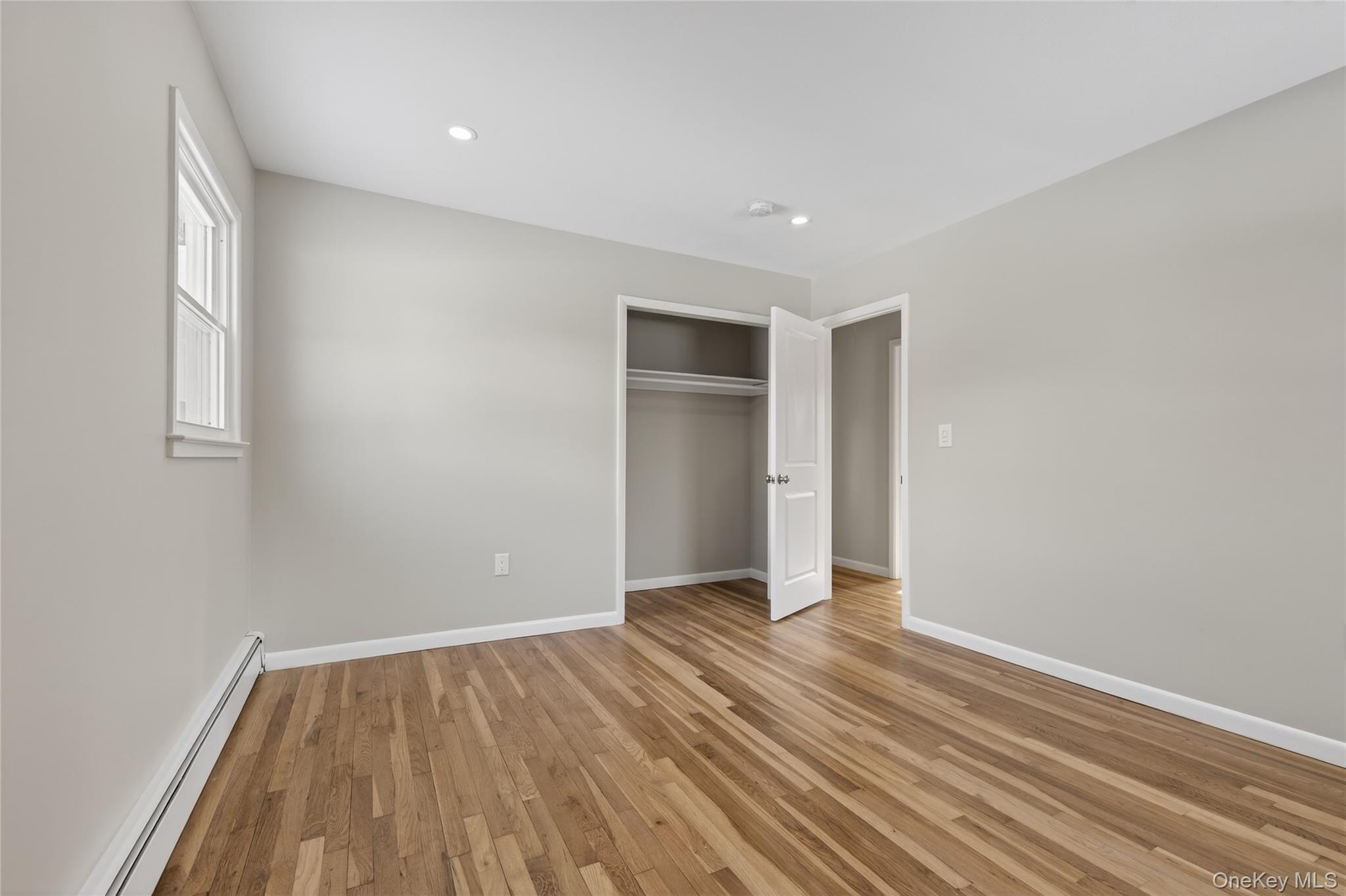 676-678 Oak Summit Road Millbrook, NY 12545 - Photo 13 of 22 a view of an empty room with wooden floor