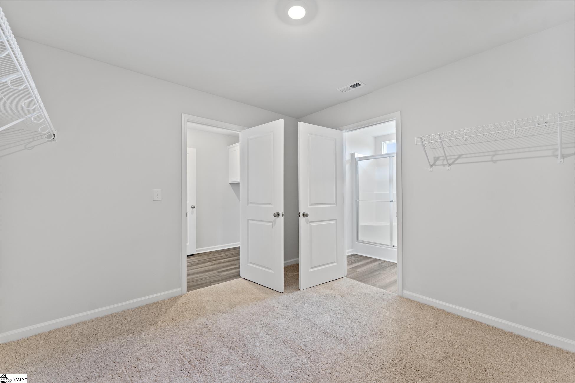 7102 Wingate Drive Inman, SC 29349 - Photo 23 of 34 The walk-in closet has access to laundry.