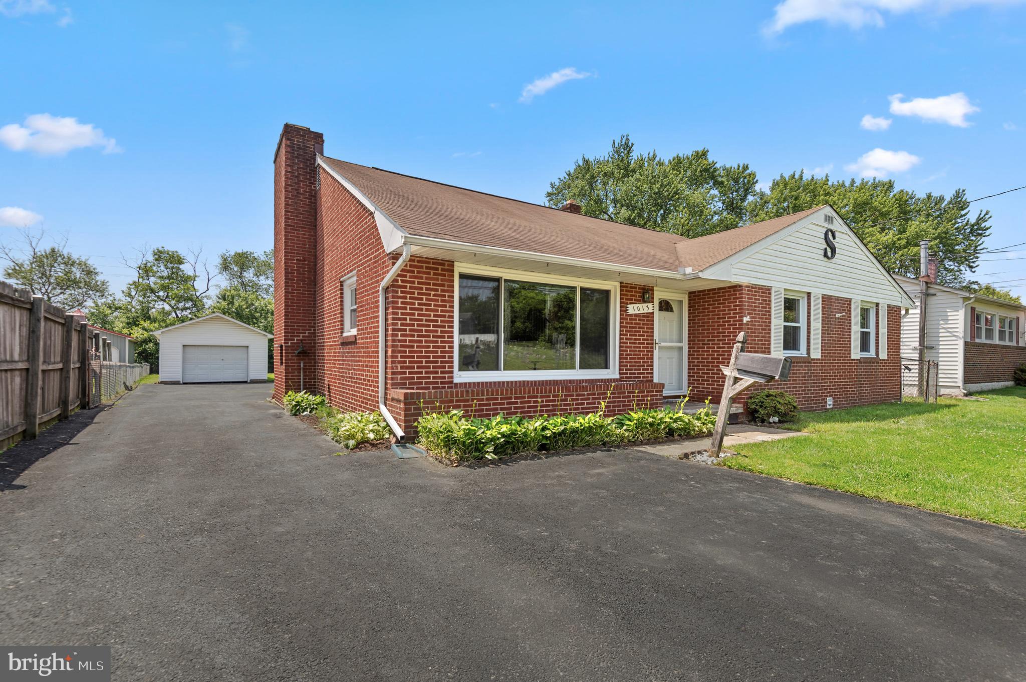 1013 Orems Road Baltimore, MD 21220 - Photo 30 of 37 a front view of a house with garden