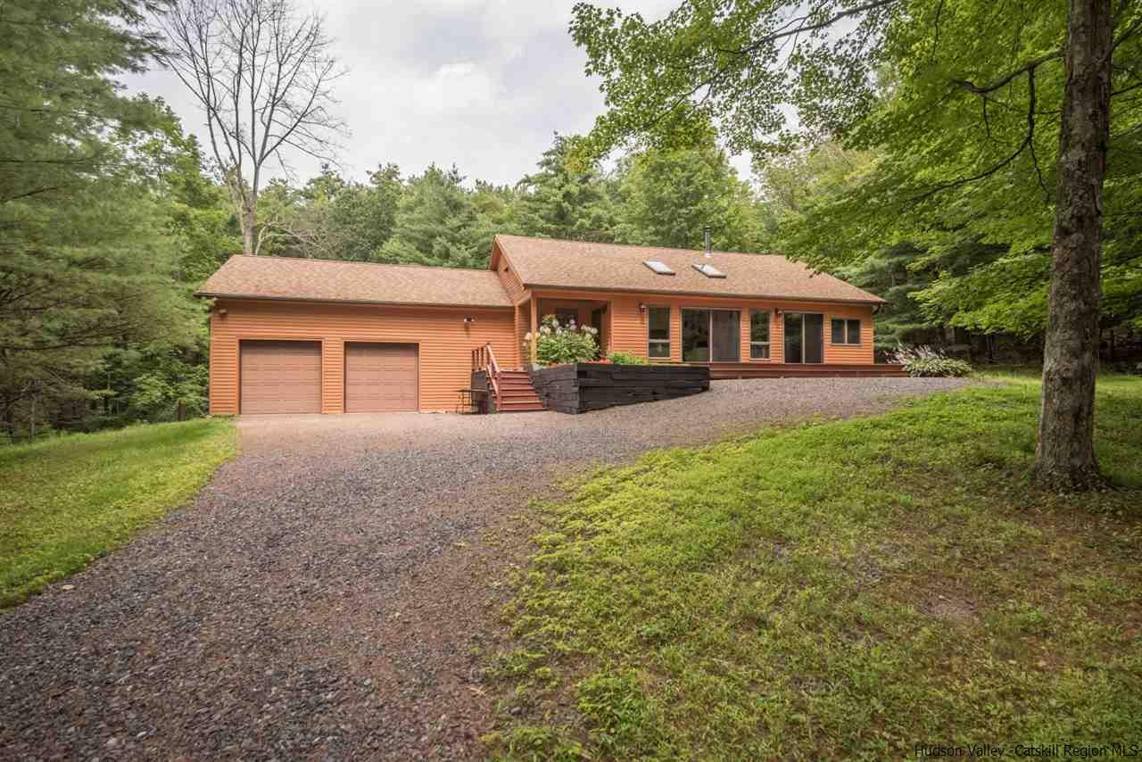 366 Buck Road Stone Ridge, NY 12484 - Photo 2 of 26 front view of a house with a yard