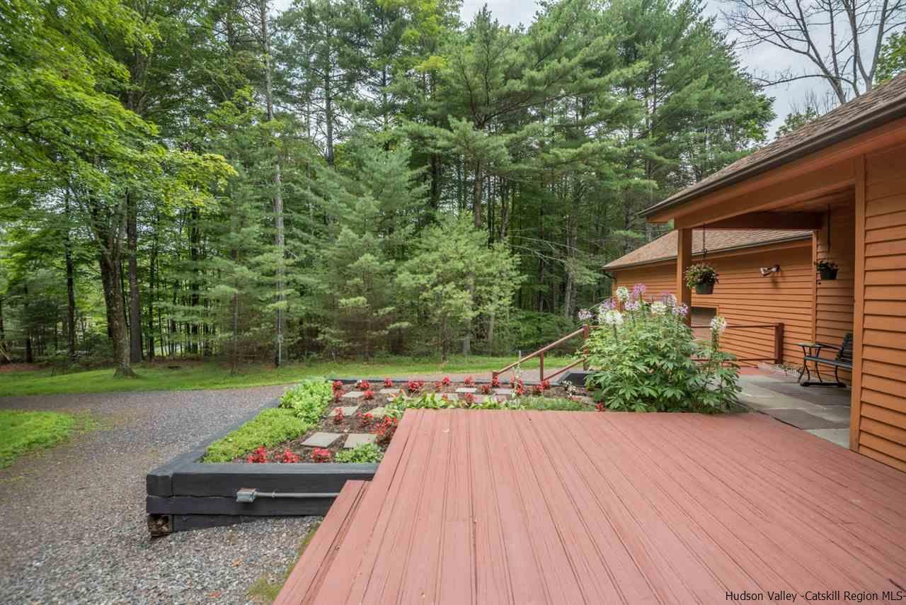 366 Buck Road Stone Ridge, NY 12484 - Photo 23 of 26 a front view of a house with garden