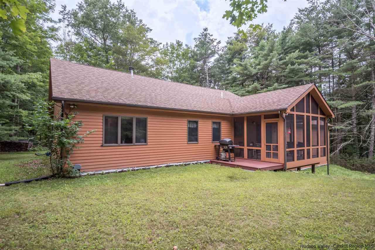 366 Buck Road Stone Ridge, NY 12484 - Photo 25 of 26 a front view of a house with garden