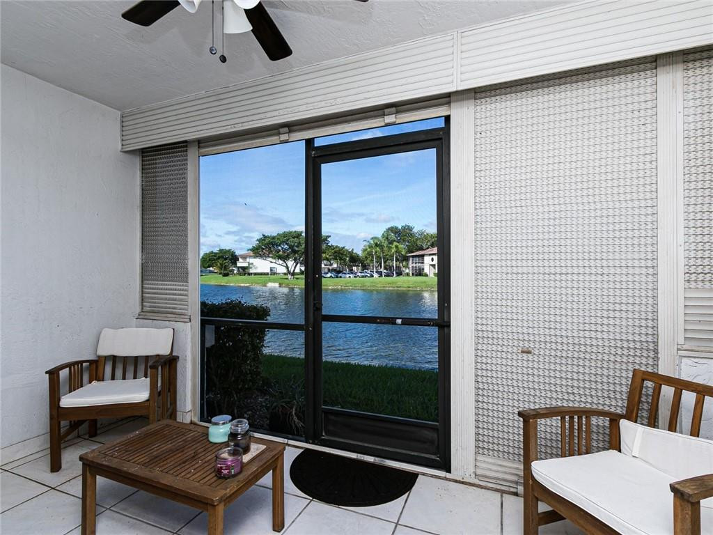 9569 West McNab Road, Unit 9569 Tamarac, FL 33321 - Photo 28 of 39 Screened porch! What a view!