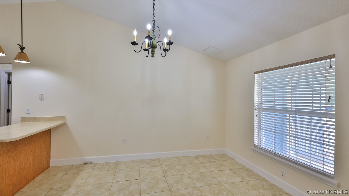 2655 Flowing Well Road DeLand, FL 32720 - Photo 15 of 23 a view of an empty room with a window