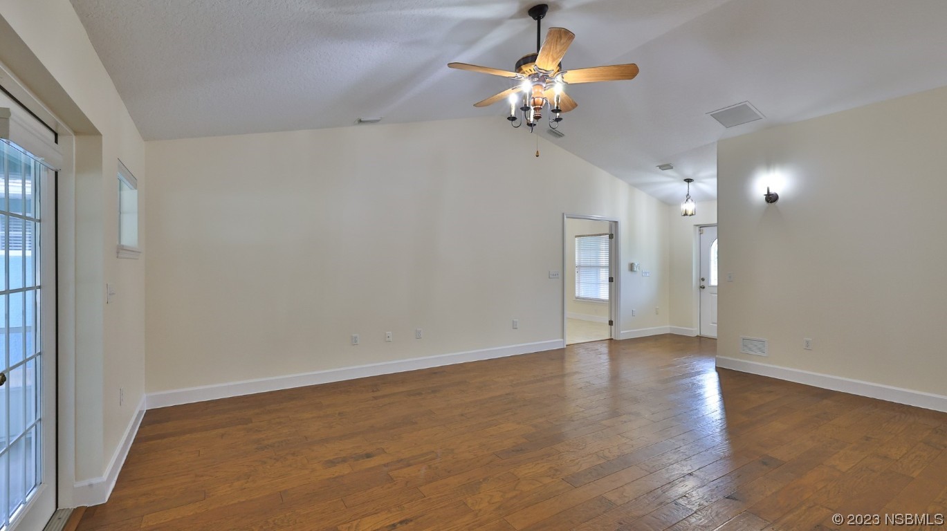 2655 Flowing Well Road DeLand, FL 32720 - Photo 18 of 23 wooden floor in an empty room with a window