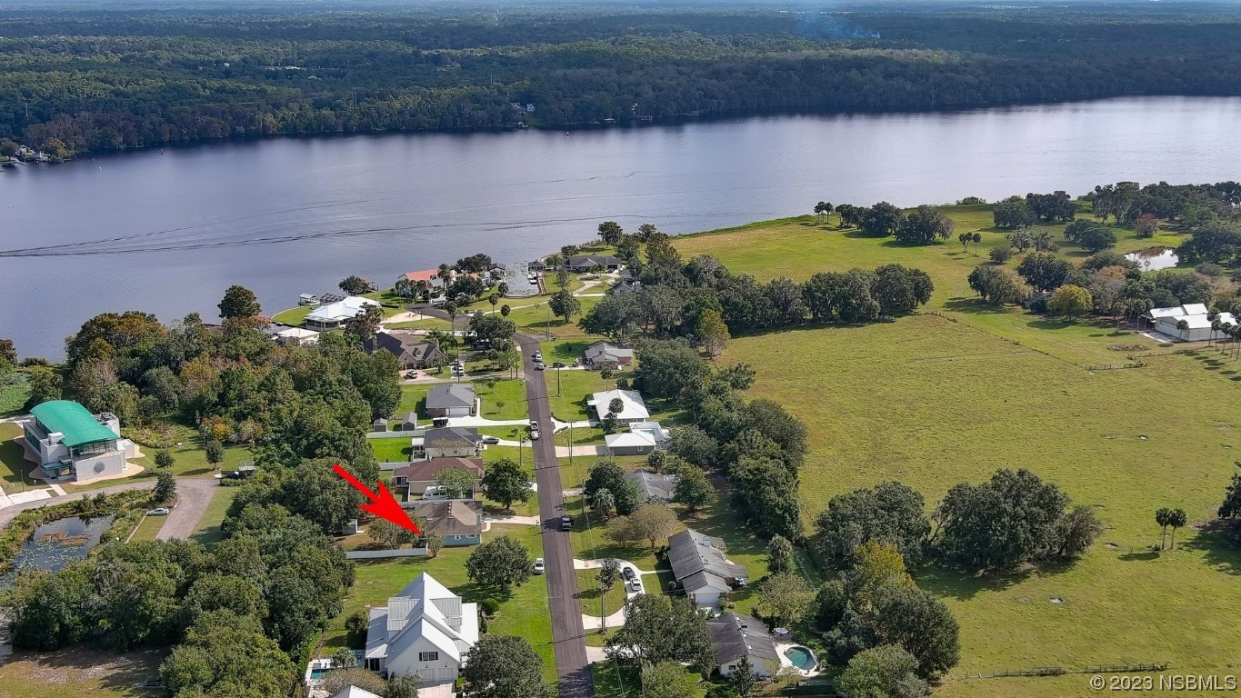 2655 Flowing Well Road DeLand, FL 32720 - Photo 21 of 23 a view of a lake