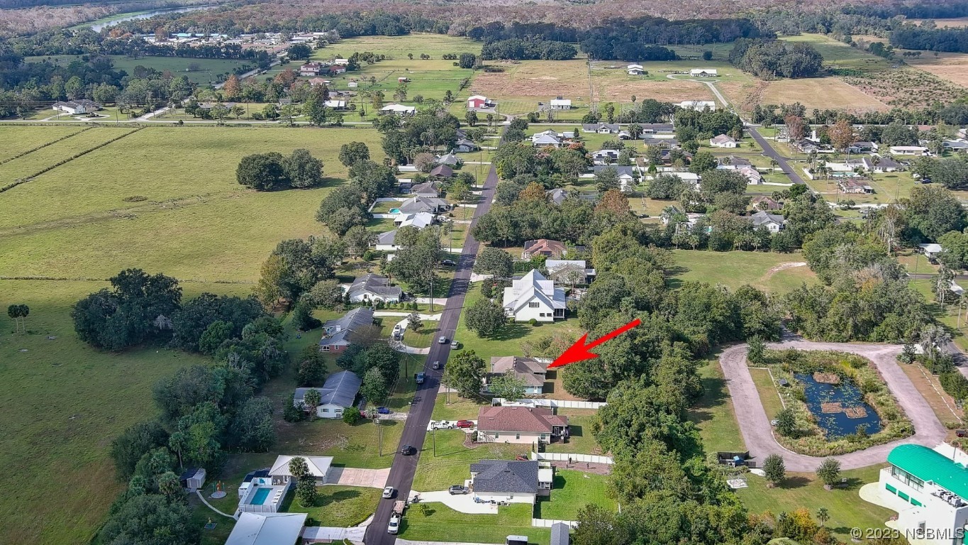 2655 Flowing Well Road DeLand, FL 32720 - Photo 22 of 23 an aerial view of ocean and residential houses with outdoor space