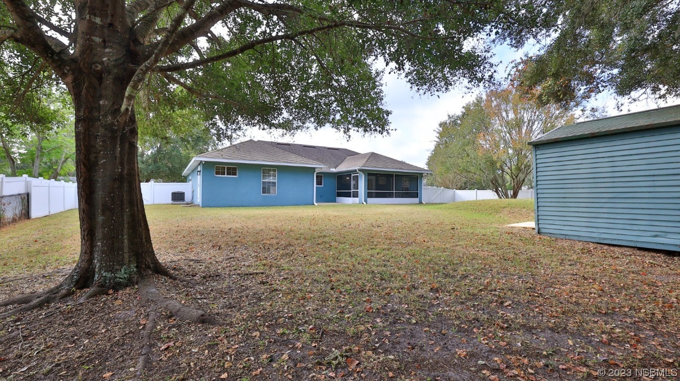 2655 Flowing Well Road DeLand, FL 32720 - Photo 7 of 23 a view of a house with a yard