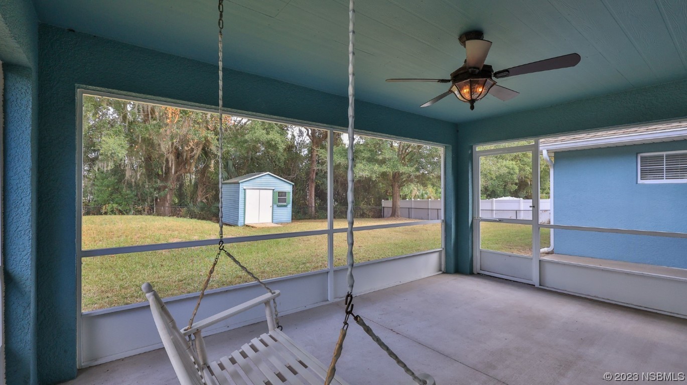 2655 Flowing Well Road DeLand, FL 32720 - Photo 8 of 23 a view of an empty room with windows