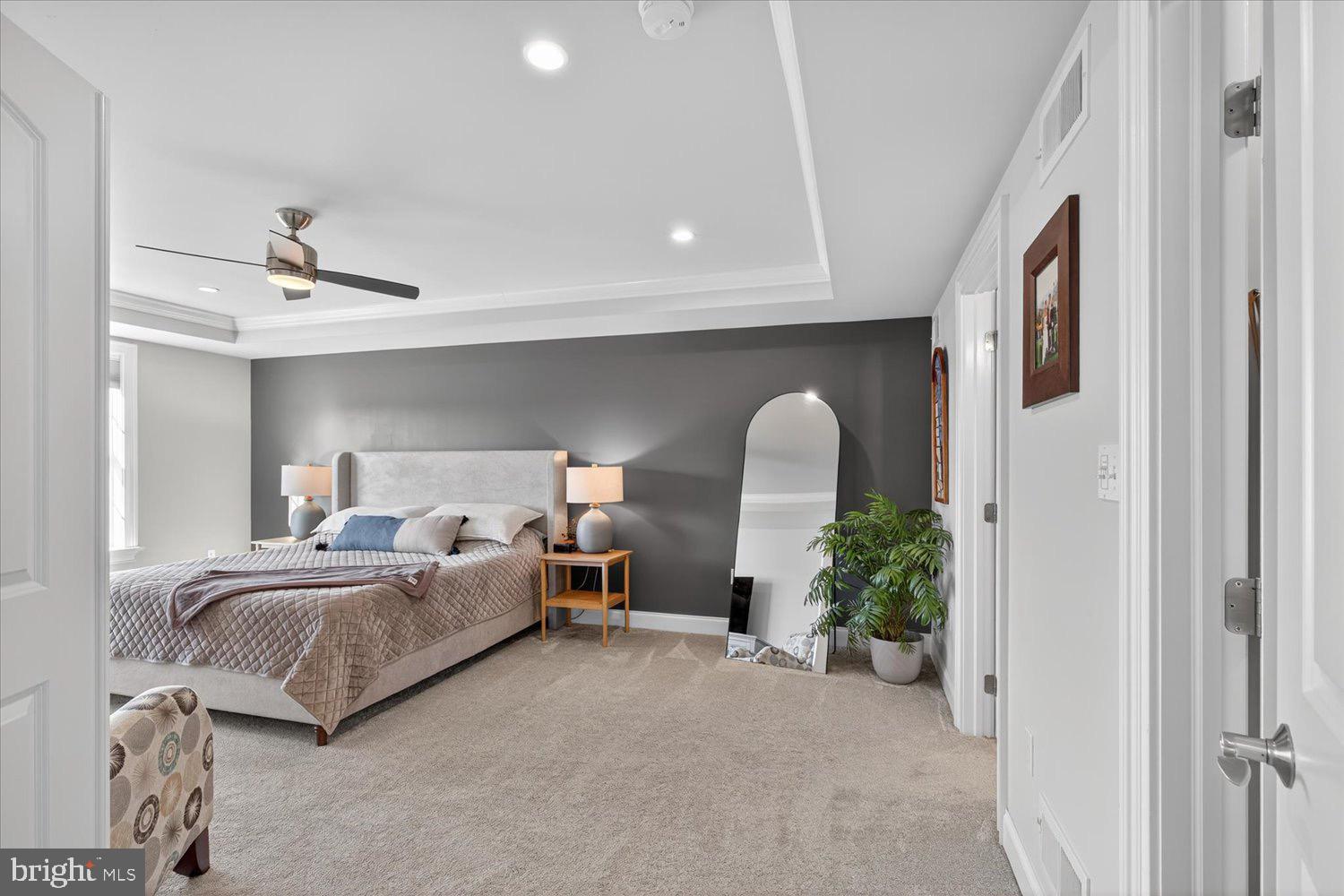 311 Ecker Drive Lititz, PA 17543 - Photo 22 of 49 a living room with a bed and a chandelier