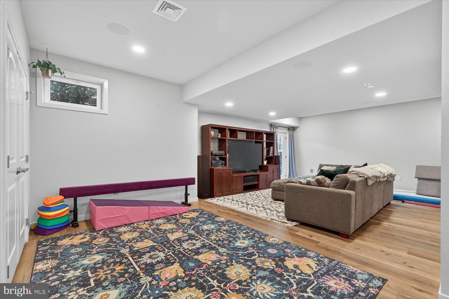 311 Ecker Drive Lititz, PA 17543 - Photo 38 of 49 a living room with furniture and a flat screen tv