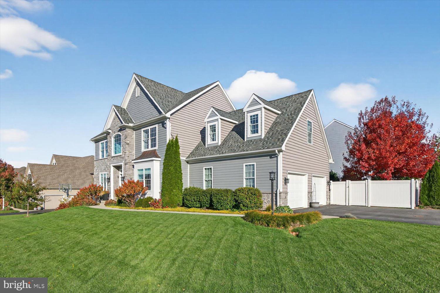 311 Ecker Drive Lititz, PA 17543 - Photo 48 of 49 a view of an house with backyard space and garden