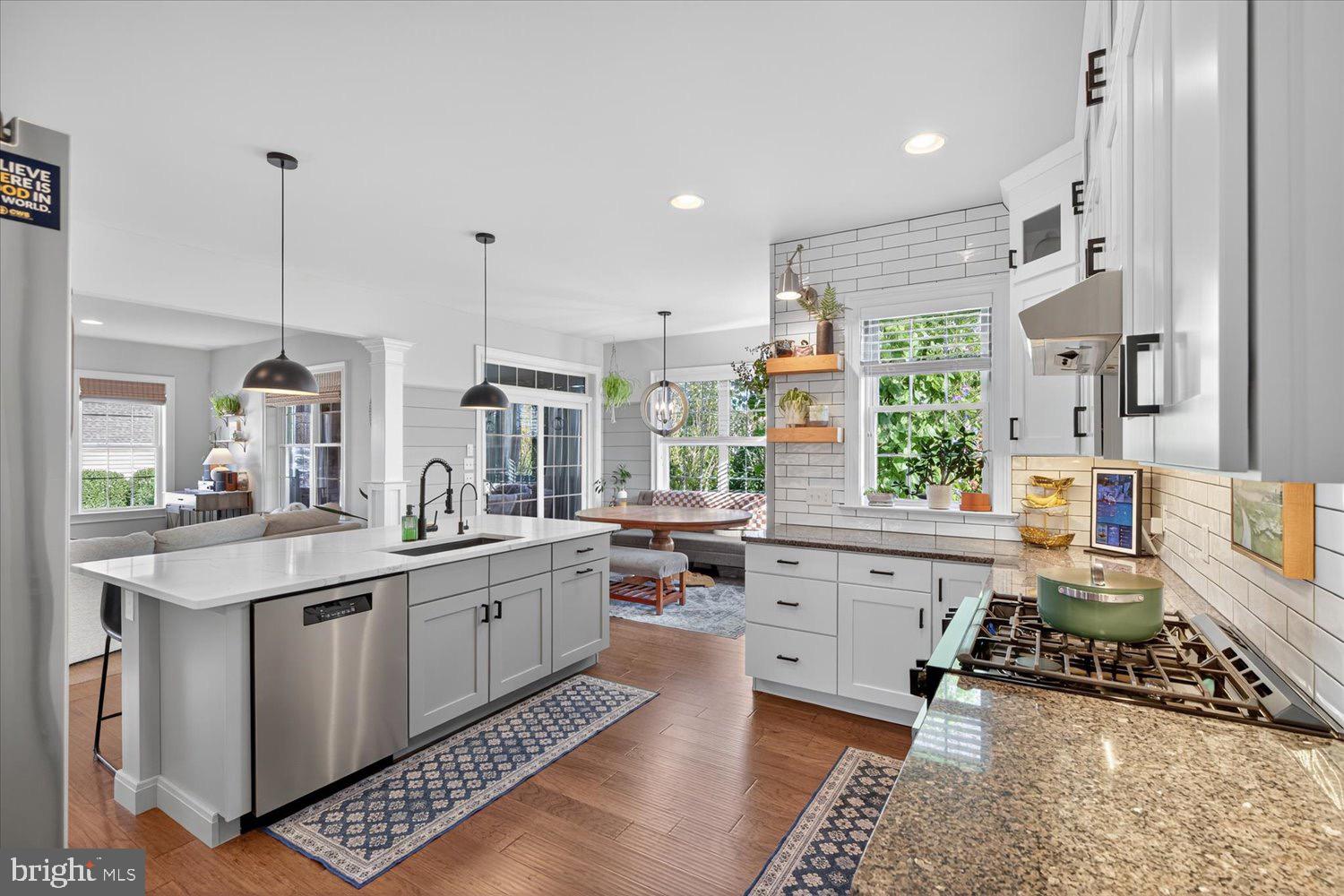 311 Ecker Drive Lititz, PA 17543 - Photo 9 of 49 a large white kitchen with a large window and stainless steel appliances