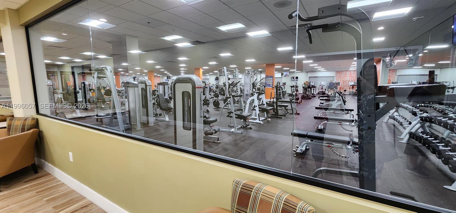 371 Brighton I, Unit 371 Boca Raton, FL 33434 - Photo 31 of 37 a view of a room with gym equipment