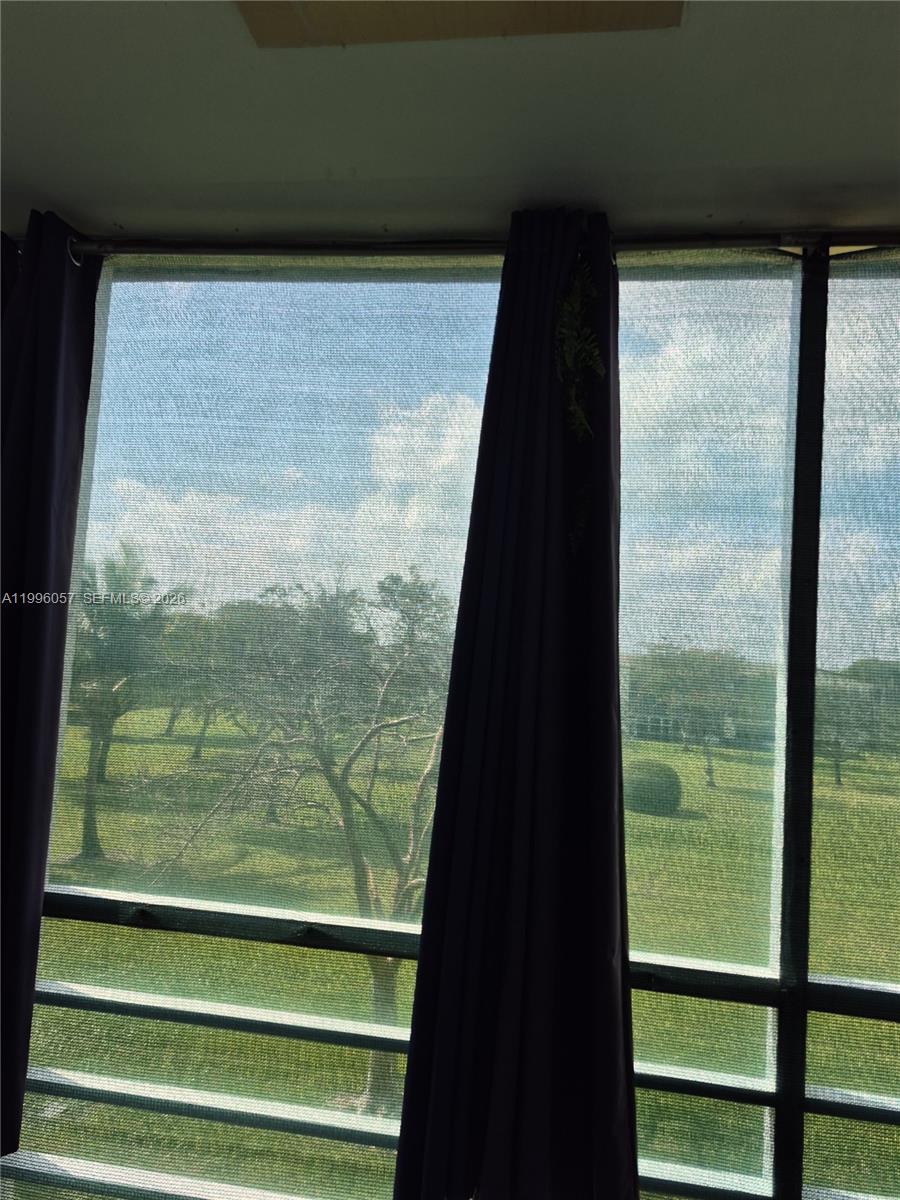 371 Brighton I, Unit 371 Boca Raton, FL 33434 - Photo 8 of 37 a view of a glass door