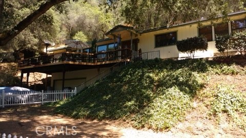 2601 Murphys Grade Road Murphys, CA 95247 - Photo 2 of 10 a front view of a house with a yard