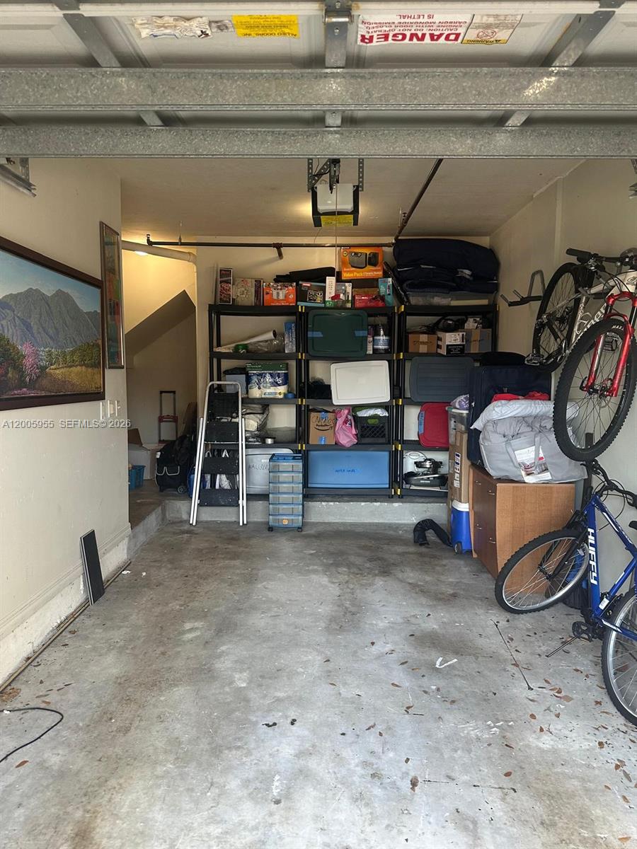 6920 West Sample Road, Unit 6920 Pompano Beach, FL 33063 - Photo 25 of 30 a view of storage and utility room