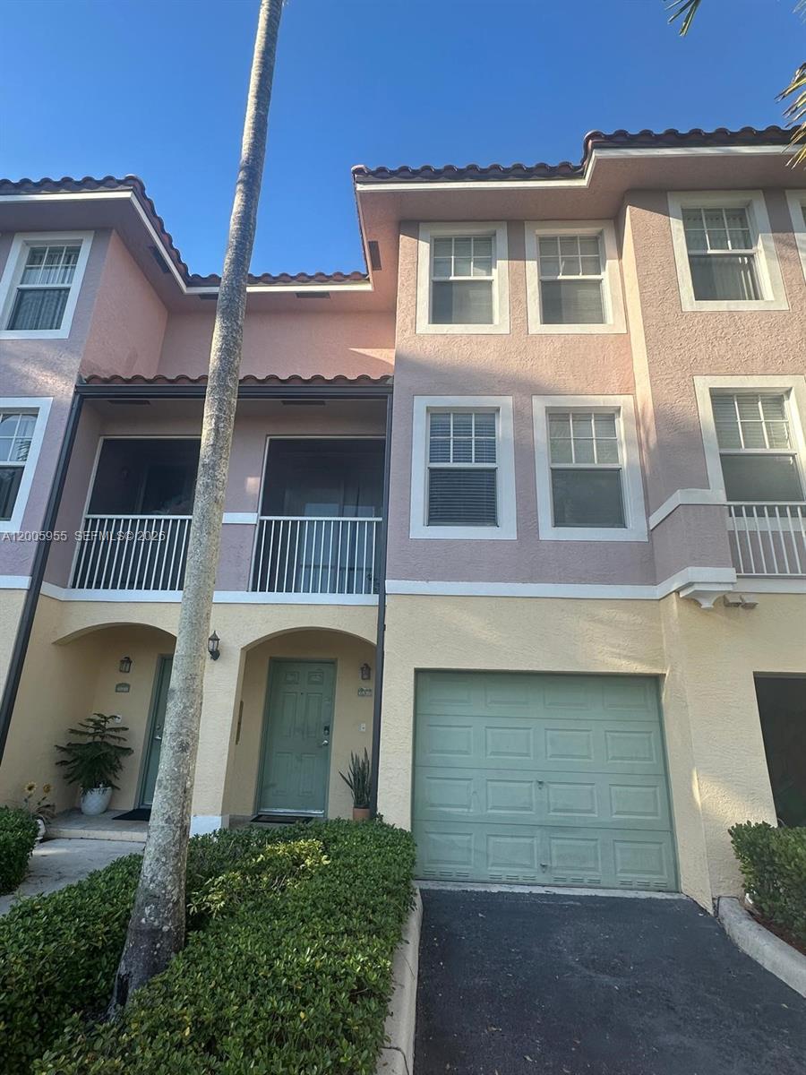 6920 West Sample Road, Unit 6920 Pompano Beach, FL 33063 - Photo 27 of 30 a front view of a house