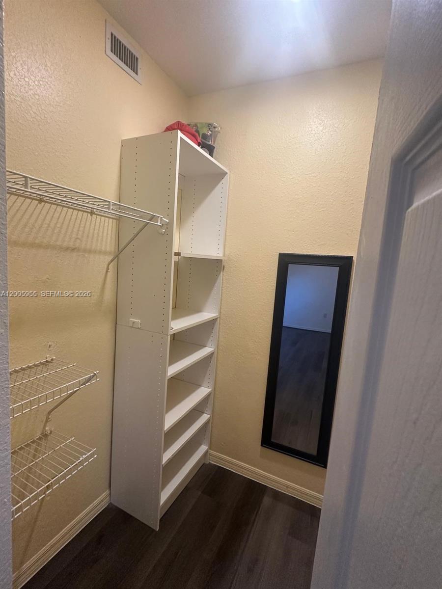 6920 West Sample Road, Unit 6920 Pompano Beach, FL 33063 - Photo 9 of 30 a view of walk in closet