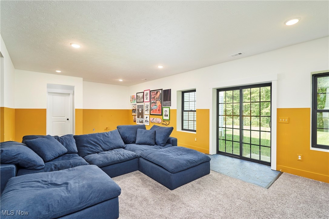 7754 Bainbridge Road Chagrin Falls, OH 44023 - Photo 26 of 35 Carpeted living room featuring recessed lighting and baseboards