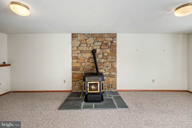 a bathroom with a sink a mirror and a shower