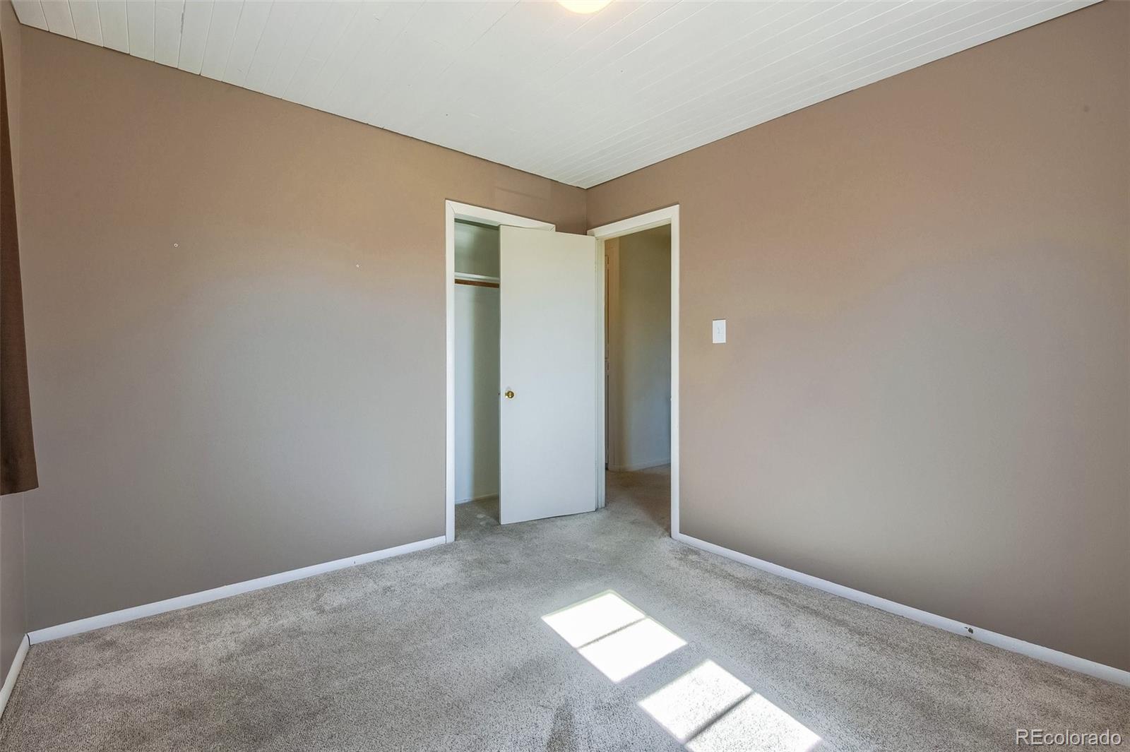 8941 Lilly Drive Thornton, CO 80229 - Photo 14 of 27 a view of an empty room